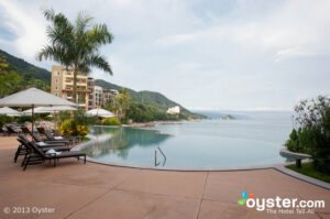 The infinity pool at Garza Blanca offers stunning views of Puerto Vallarta's rugged coastline.