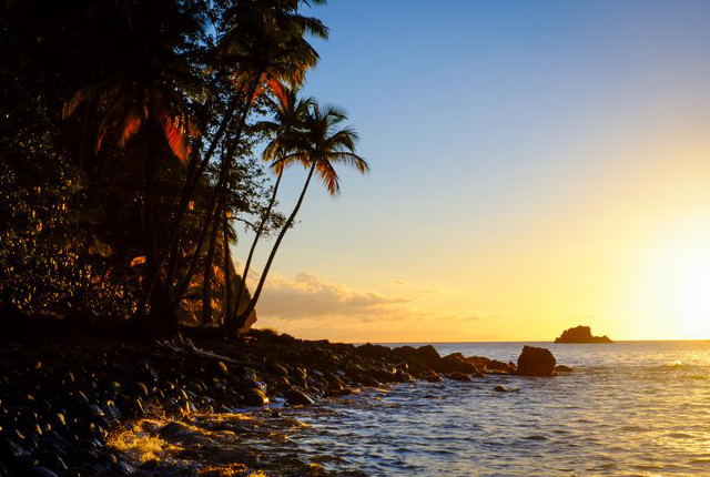 The sun sets at Anse Couleuvre in Martinique. Courtesy of Ryan Smith