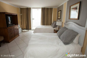 Oceanfront Deluxe Room #1 Post Renovation -- we <3 the yellow and gray combo!