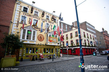 Pubs along Dublin's Temple Bar beckon visitors with their traditional bites and brews.