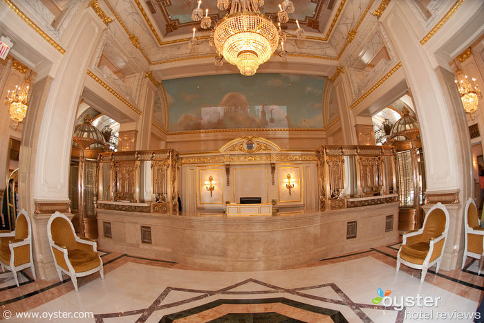 Lobby of St. Regis New York, a luxury hotel offering a third night free through NYC & Company