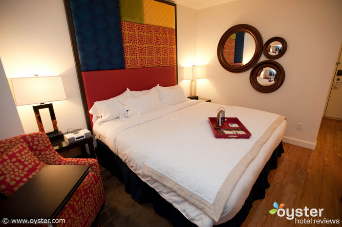 Hotel Indigo's cheery rooms are comfortable and well-equipped, perfect for fans who drag their significant other along.