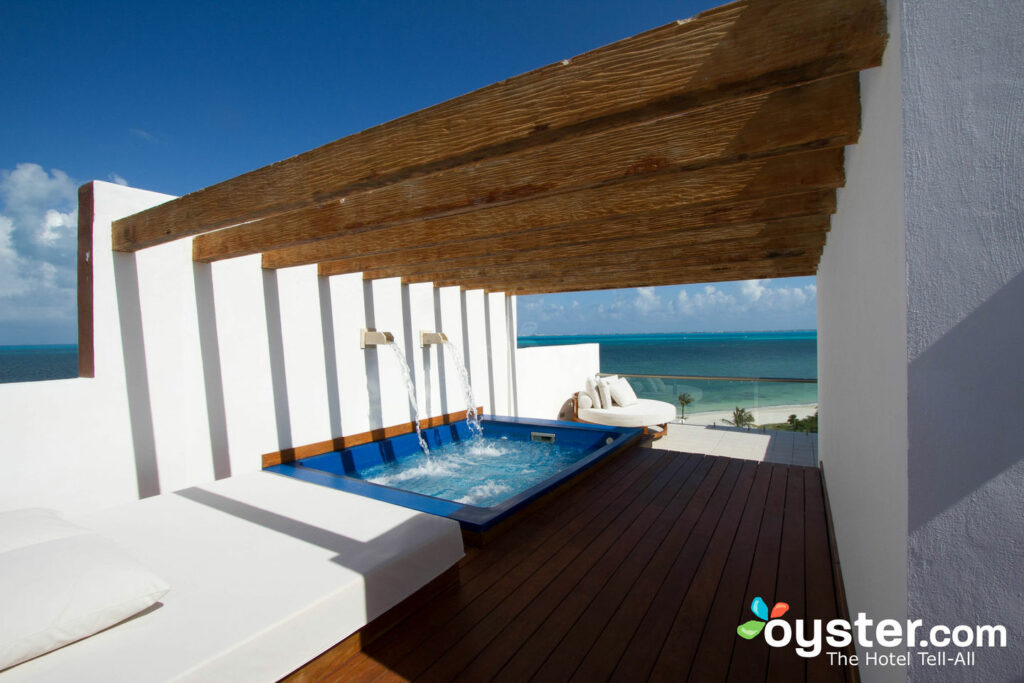 The Excellence Club Two-Story Rooftop Terrace Suite with Ocean Front at the Excellence Playa Mujeres