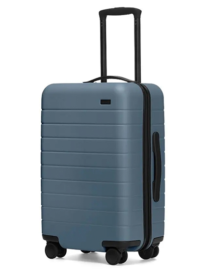 Carry-on suitcase by Away in blue