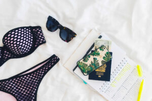 Bikini, sunglasses, money, passport